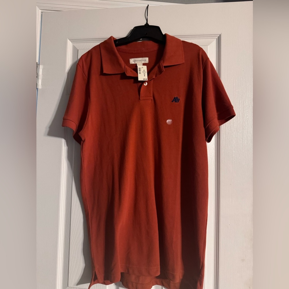 Aeropostale polo shirt. Size large. Orange. Brand new with tags.